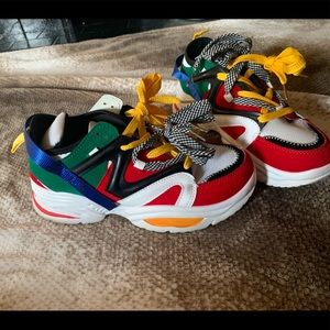 Used tri-color gym shoes